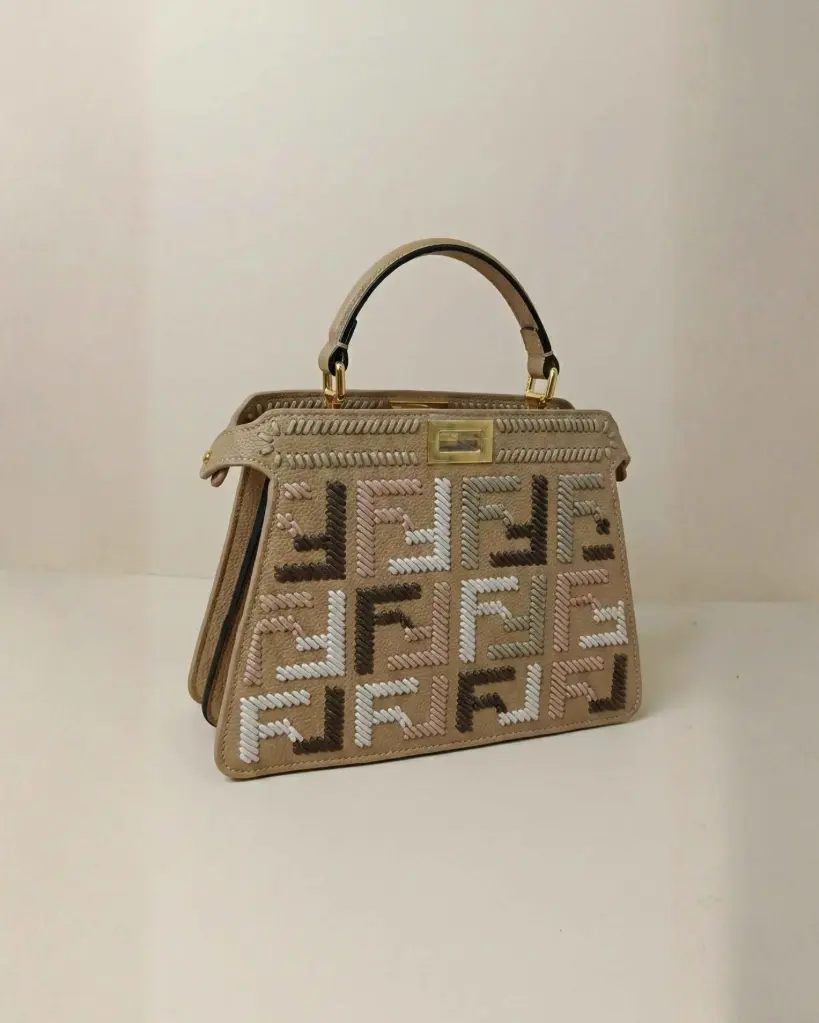 "Classic Modern" Handbag with Embossed Patterns and Gold Lock