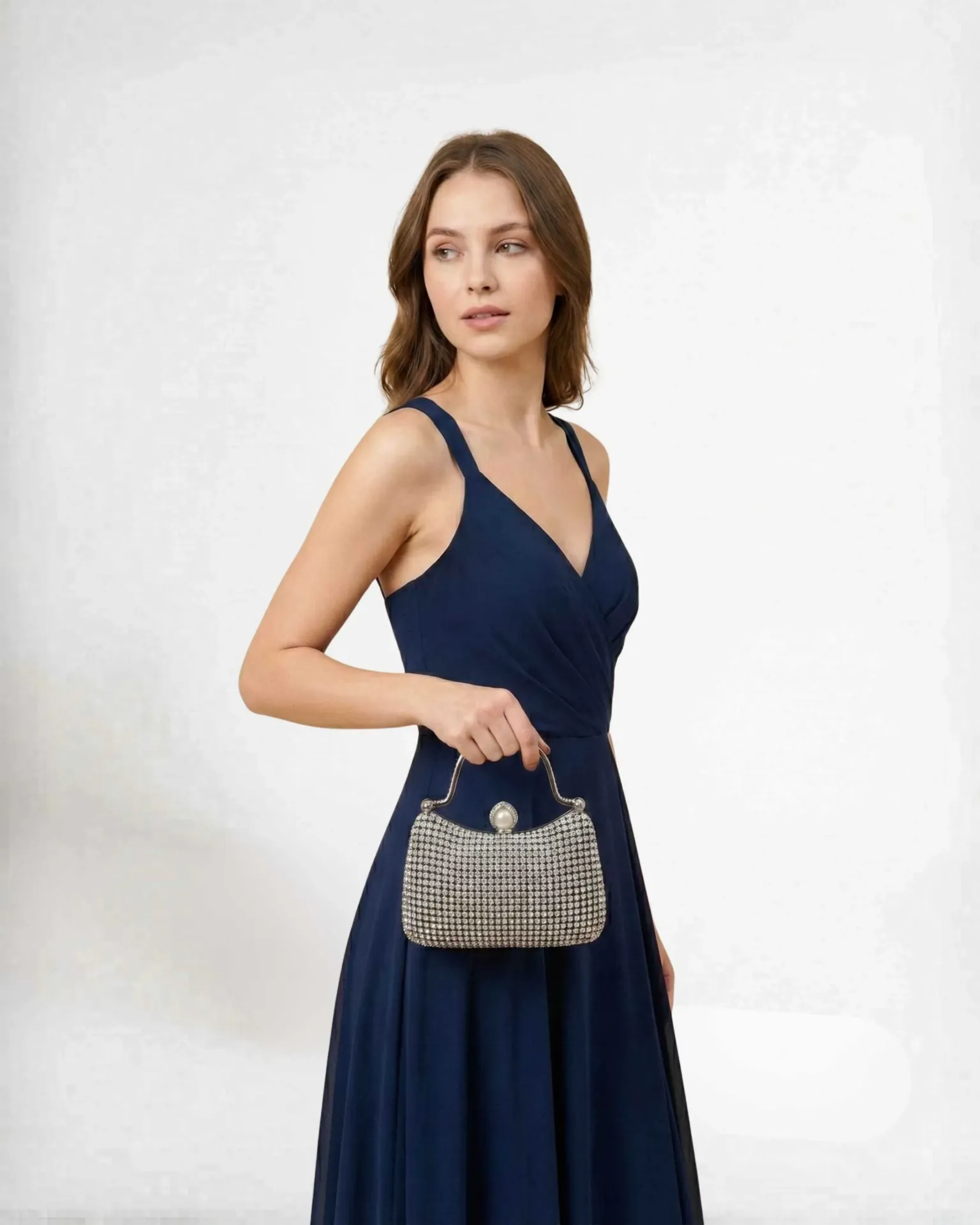 Luxury Silver-Frame Gala Bag with Shimmering Crystals.